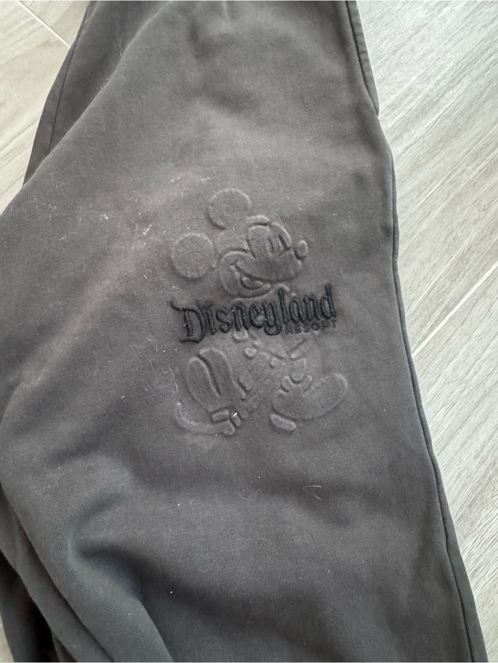 Disneyland Embossed Mickey Black sweats
